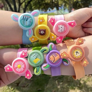 Đồng hồ xoay đập tay trẻ em vòng tay đồ chơi đeo hoạt hình phát sáng quà tặng cho bé