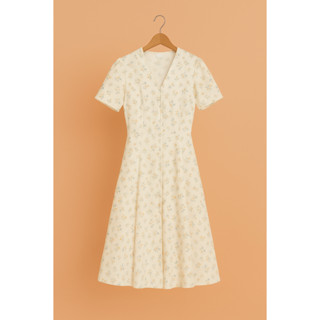 Váy Hoa Cổ Chữ V Mã V2025281 Evalover – Dáng Xòe, Phối Cúc, Vải Thô Mềm Mát Không Nhăn