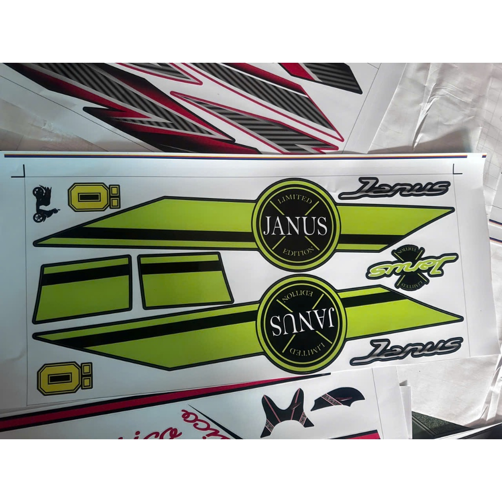 tem rời JANUS  xanh non dán xe đen