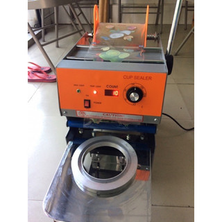 Máy dán miệng ly nước mía 1 lít eton W2