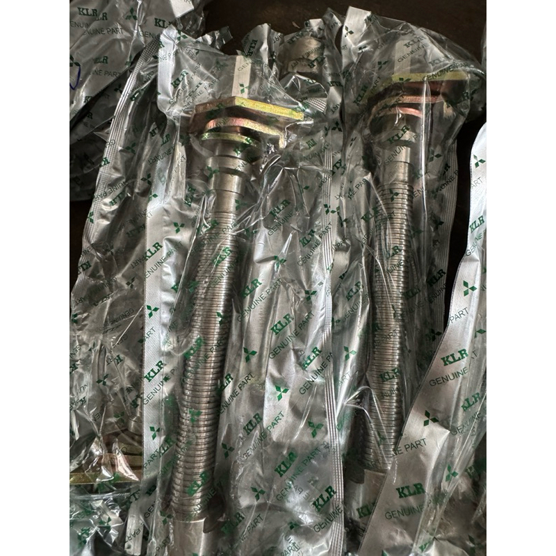 Cây tăng đưa căng xích máy gặt lúa Kubota DC70