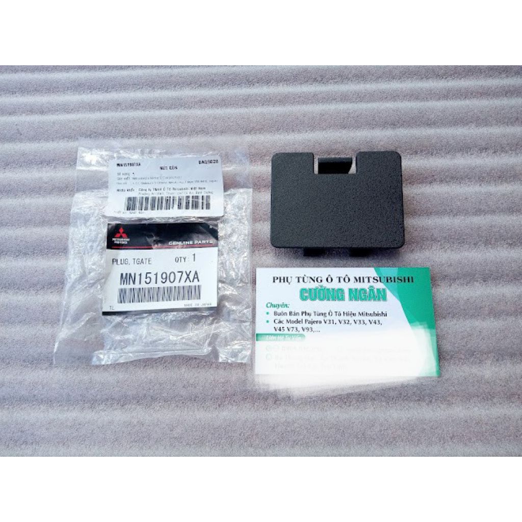 Nắp đậy tapi sau (Plug tailgate) Pajero V93 MN151907XA