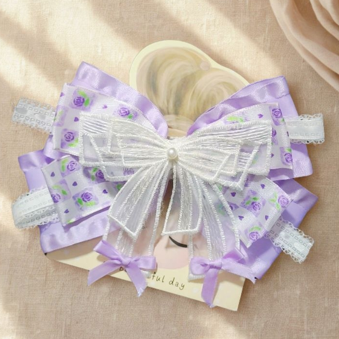 Kẹp tóc tiểu thư tím nơ trắng xinh xắn