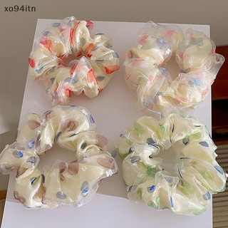 Dây buộc tóc hoa mùa hè phổ biến cho nữ
