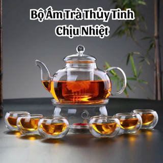 Bộ Ấm Trà Thủy Tinh Kèm Khay Bình Trà Tặng 6 Chén Uống Trà Hoa Cúc Trong Suốt Đế Đốt Nến Chịu Nhiệt