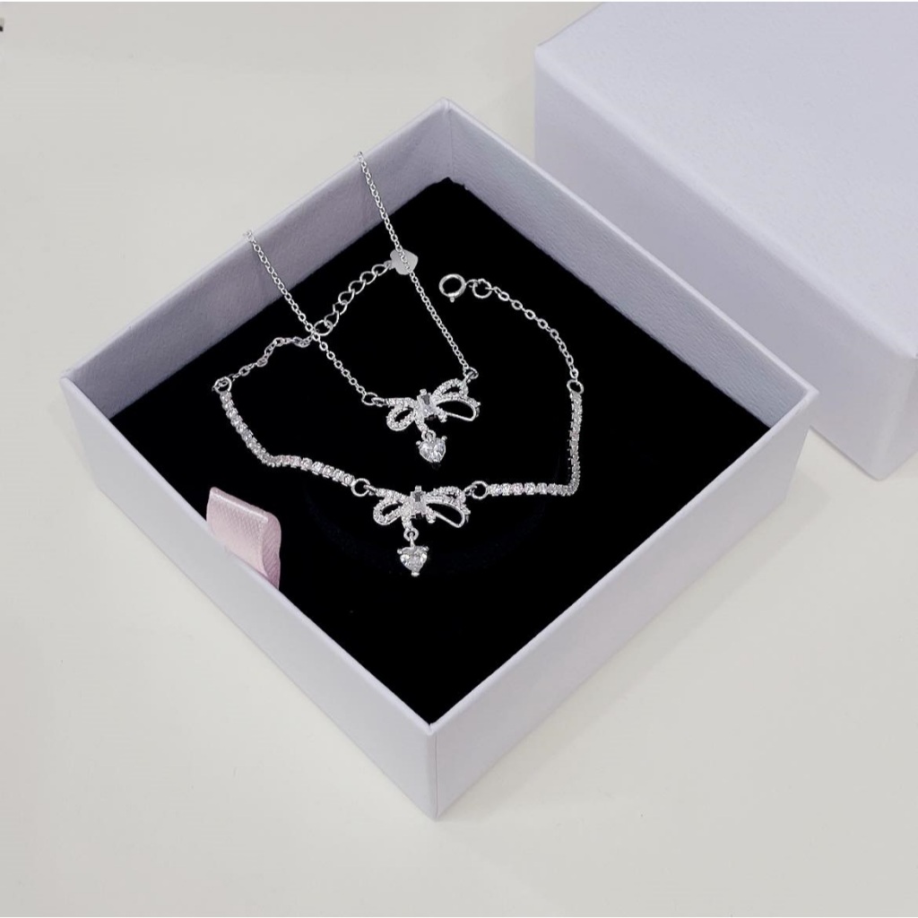 Dây chuyền nơ đá mới bạc ta và lắc tay