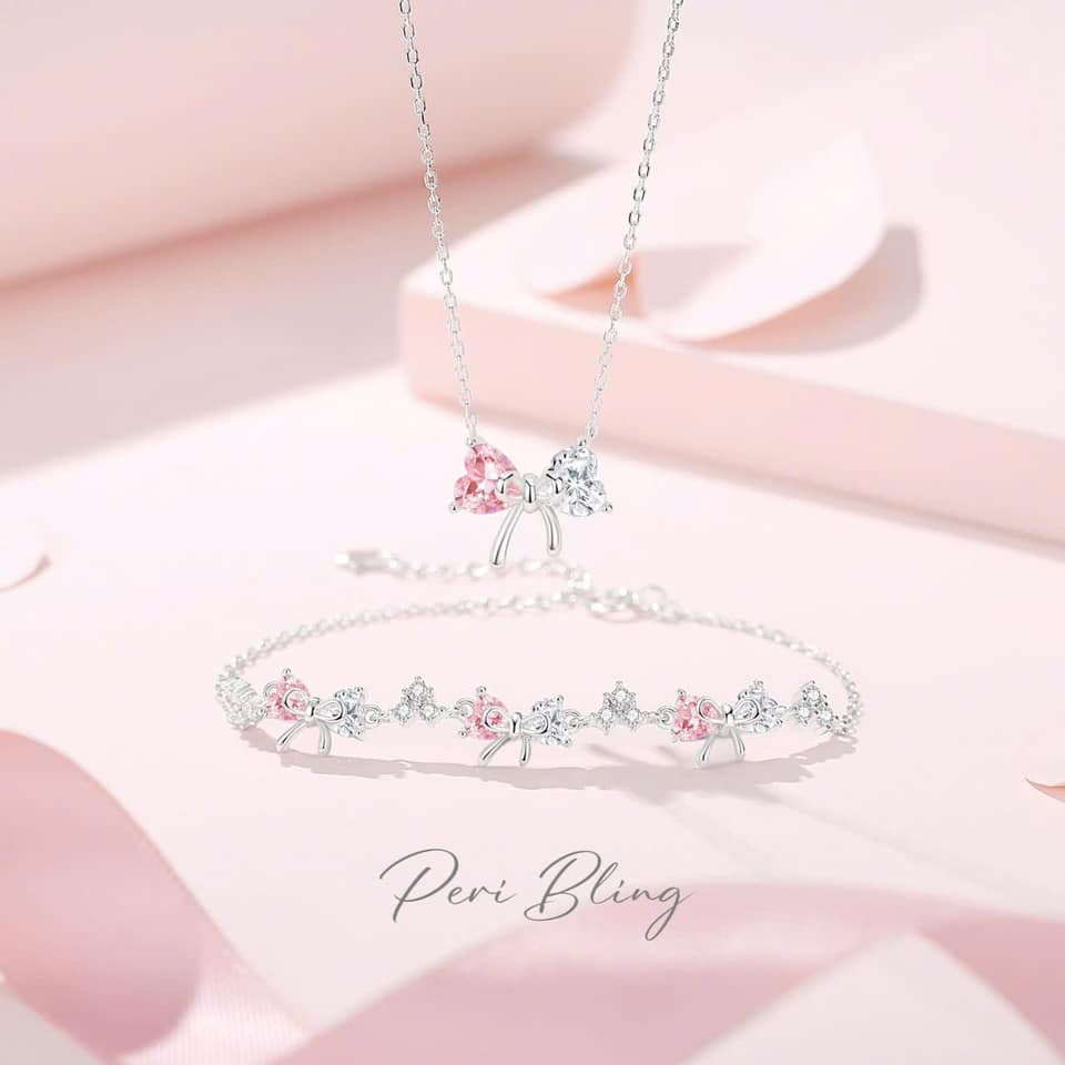 Dây chuyền nữ nơ mới bạc ta