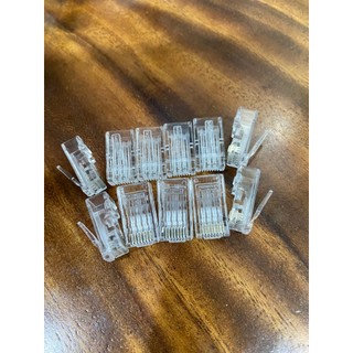 Hạt mạng Cat6 UTP ANCOMTECK AC-US6-P100, chân sole đồng rãnh to