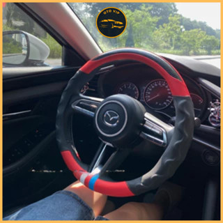 Bọc vô lăng tròn vân carbon 3 sọc phối da nhiều màu size 38cm dùng cho xe hơi giúp xế yêu của bạn trở nên lung linh hơn