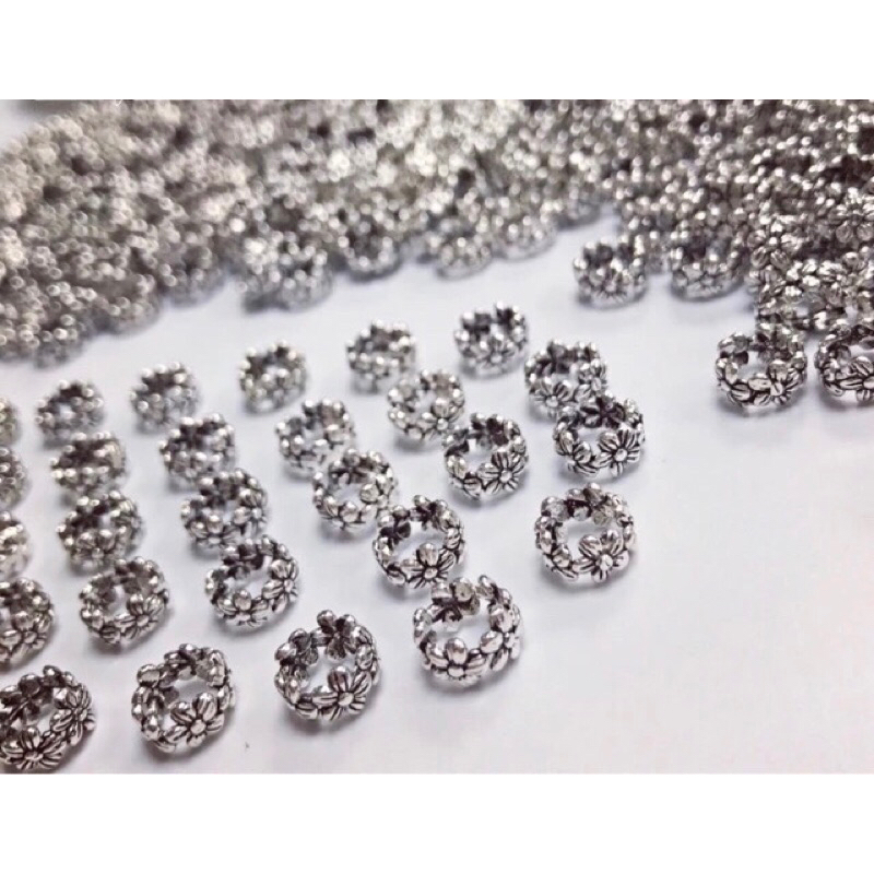 Charm chặn hình hoa bạc Thái S925