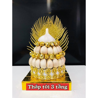 Tháp tỏi dâng ban thờ Thần Tài