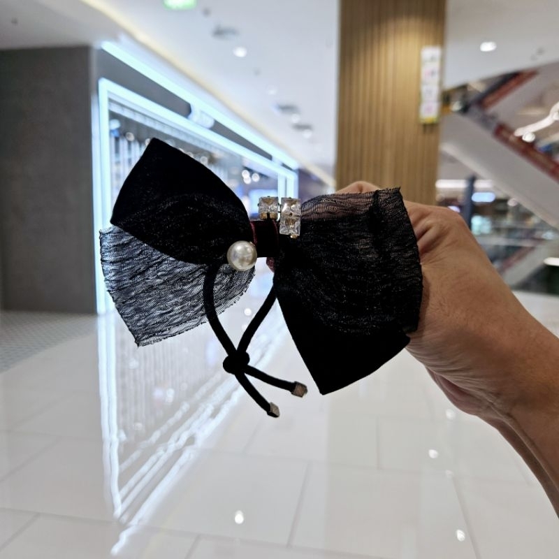 Cột tóc nơ Nhà bí