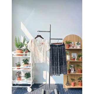 Chân váy dập li nơ eo