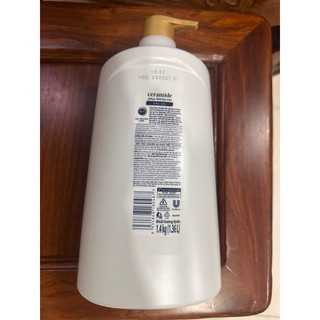 Dầu gội Dove 1kg4 tặng Vaseline 70ml