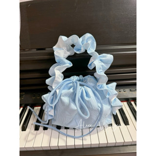 Túi xách nữ cầm tay bèo nhún rút dây phối cùng váy đầm, áo dài hot trend