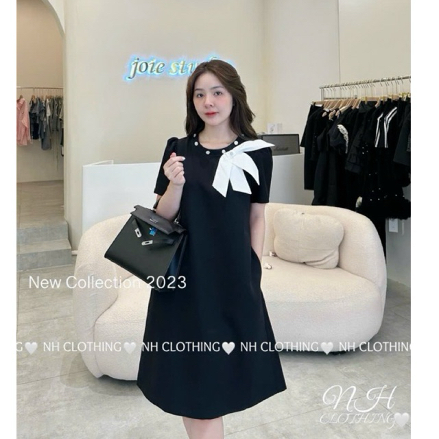 Váy nơ lệch cổ đá sm