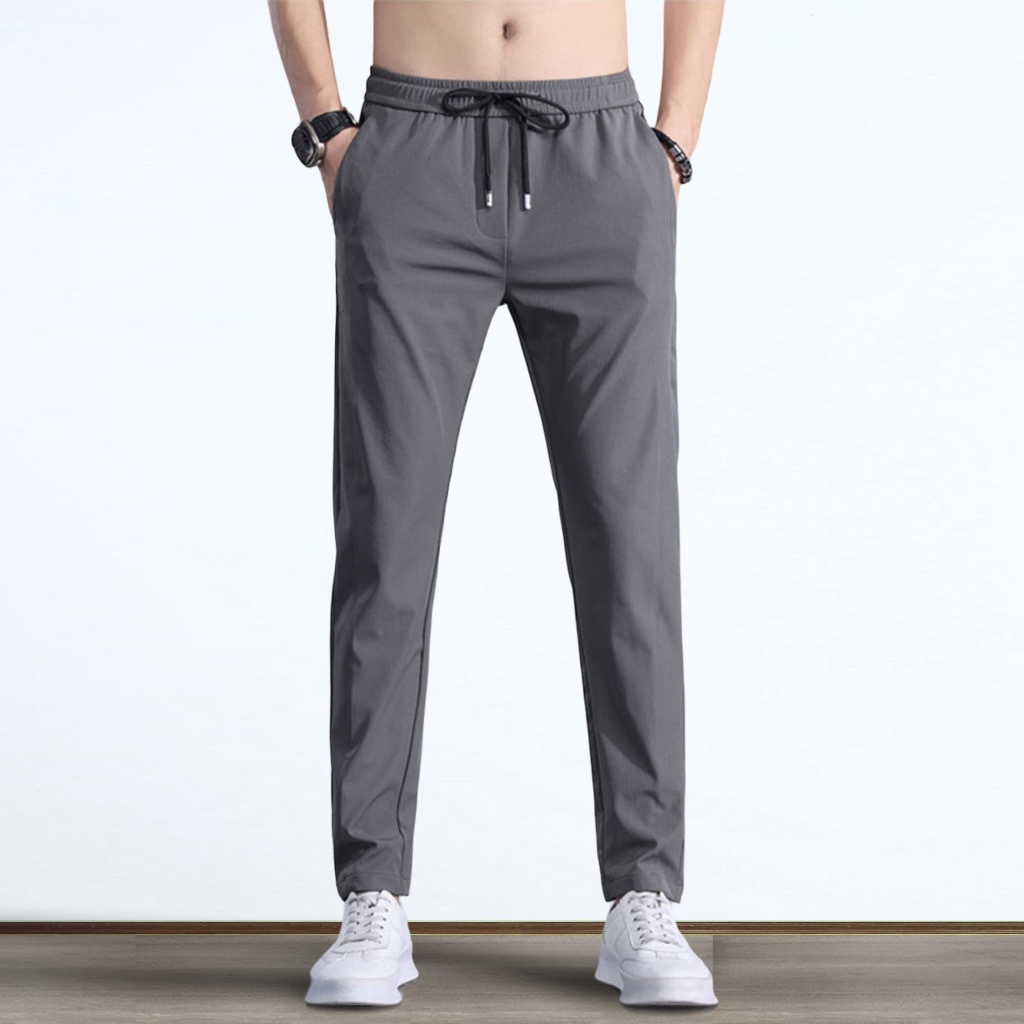 Quần dài thể thao nam vải dù mềm,co dãn nhẹ, có khóa túi phom dáng đẹp mặc được 4 mùa