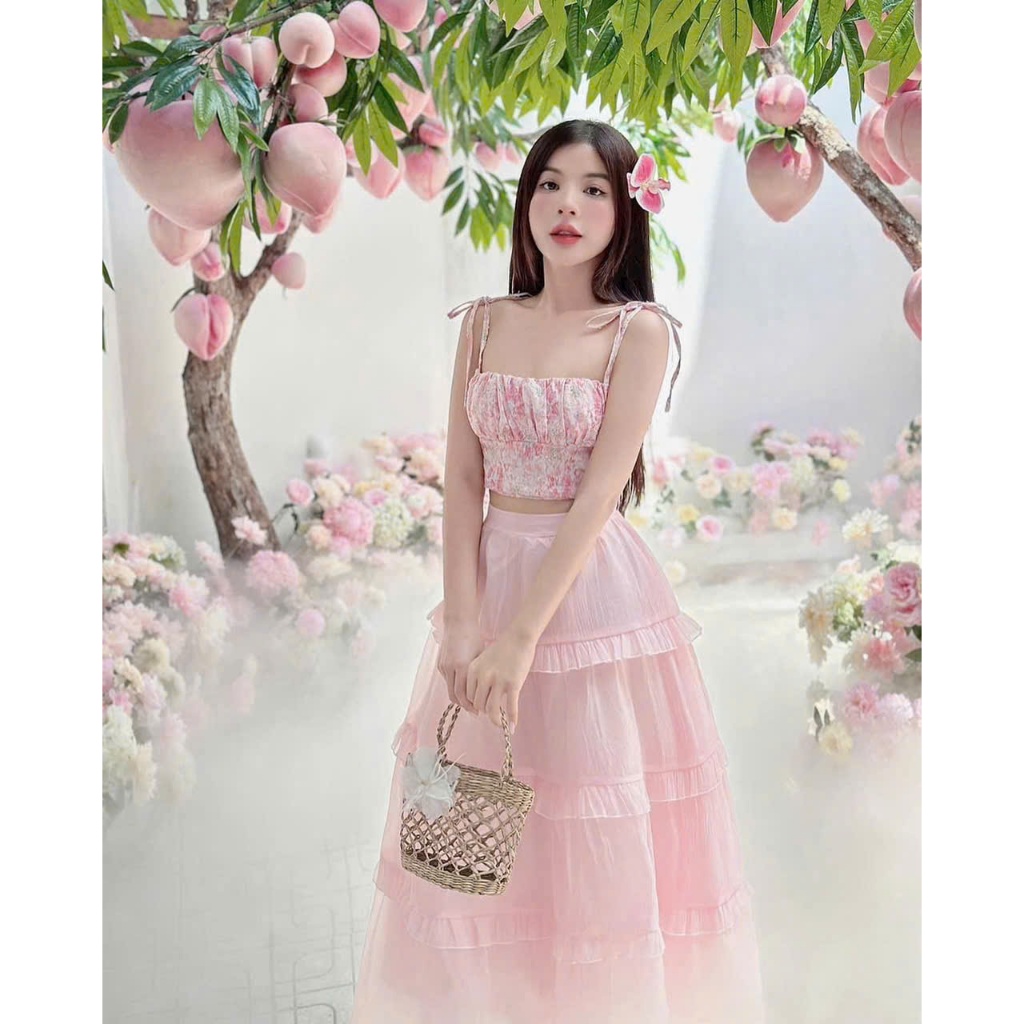 Set váy thời trang bánh bèo màu hồng dễ thương áo cúp ngực hai dây cột nơ chân váy dáng dài xoè viền