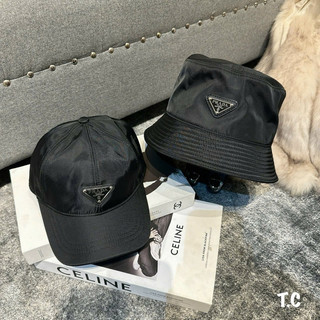 Cặp mũ bucket và lưỡi trai prada gió