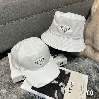 Cặp mũ bucket và lưỡi trai prada gió