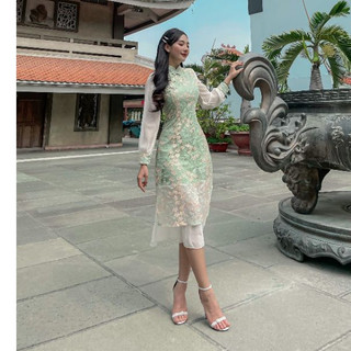 Sườn xám xanh thêu hoa...