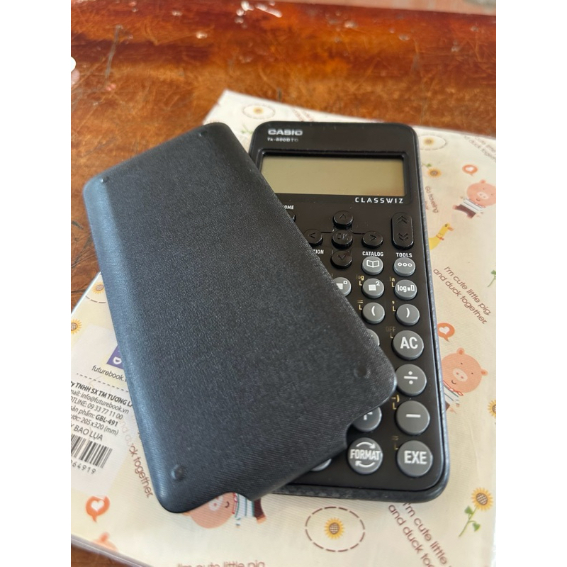 Pass máy tính Casio fx-880BTG chính hãng màu đen LIKENEW còn giấy bảo hành và hộp máy mới