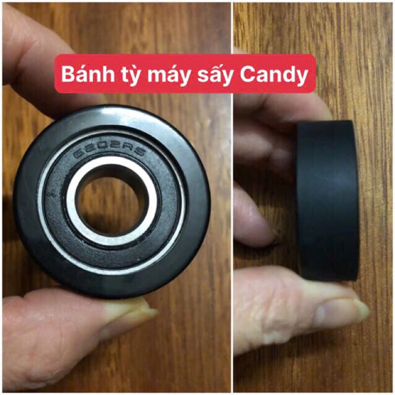 Bánh tỳ đỡ lồng máy sấy CANDY