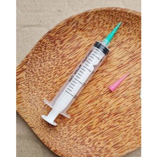 Ống bơm kim tiêm vẽ rau câu