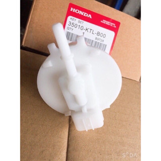 Vỏ bơm xăng Sonic chính hãng mitsuba ,đầu dẫn nhiên liệu ,nắp trên cụm bơm xăng