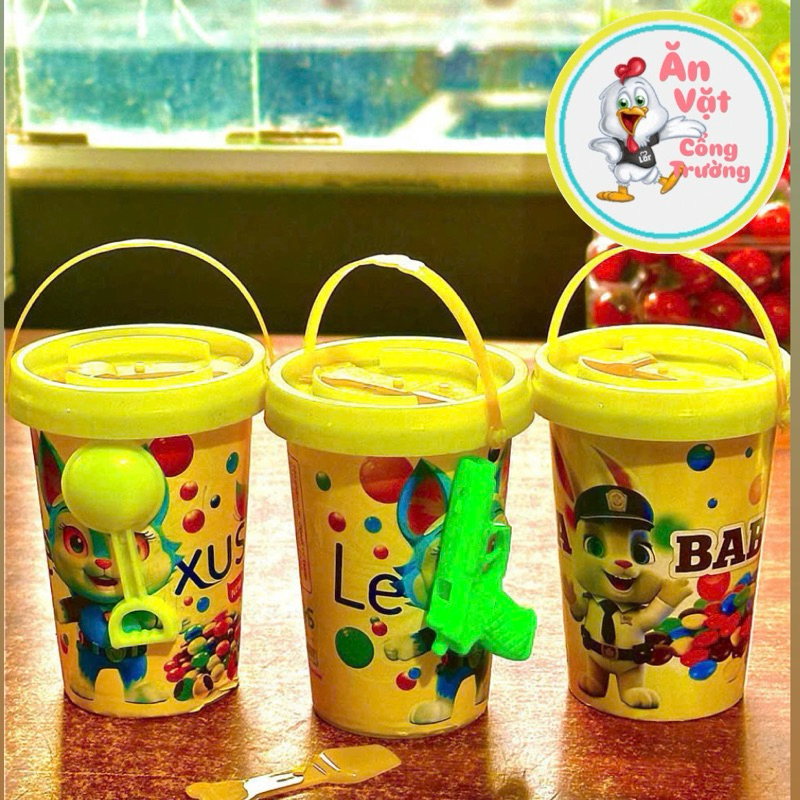 Sỉ lốc 20 xô kẹo kèm thưởng đồ chơi, kẹo socola kèm thưởng lẻ 5k, xô kẹo thưởng đồ chơi, ăn vặt tuổi