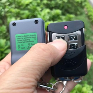 Remote điều khiển cửa cuốn TEC 433Mhz, pin 12V, viền kim loại + nhựa ABS cao cấp