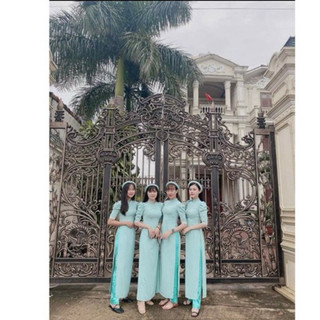Áo dài trơn xanh tay bồng mix ngọc kèm quần.
