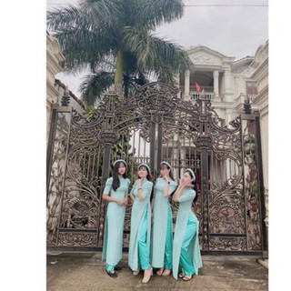 Áo dài trơn xanh tay bồng mix ngọc kèm quần.