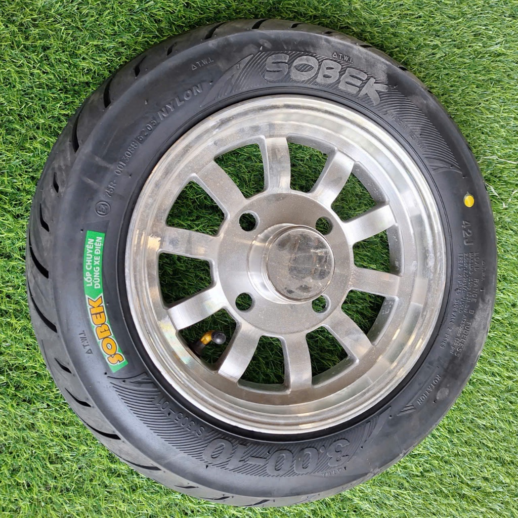 Bánh 4 ốc 300-10 tâm ốc 7-10 ,  bánh 300-10 nhôm đúc lốp ko săm 300-10 cho xe độ chế 3, 4 bánh xe rù