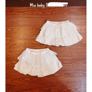 Quần váy xoè 2 tầng xuat du bé gái màu kem phối ren