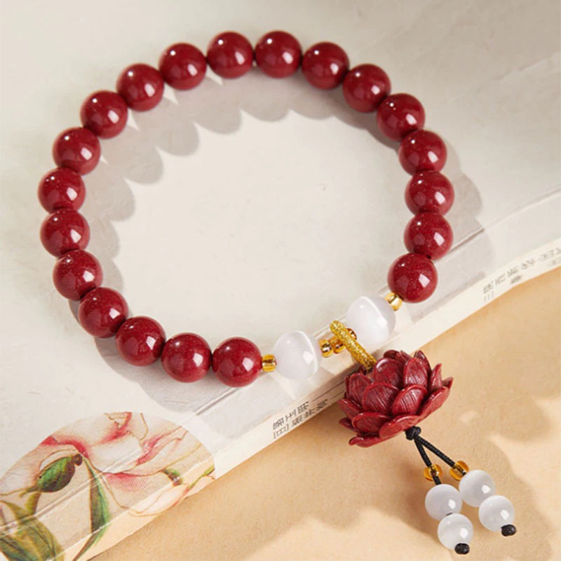 VÒNG TAY ĐÁ CHU SA NGỌC BÍCH HOA SEN CHU SA BÌNH AN