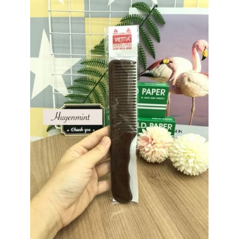 Lược gỗ thưa chảy tóc