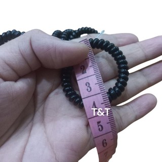 Cột tóc Lò xo màu đen cở nhí,đường kính 3cm-3.5cm(1 sợi)