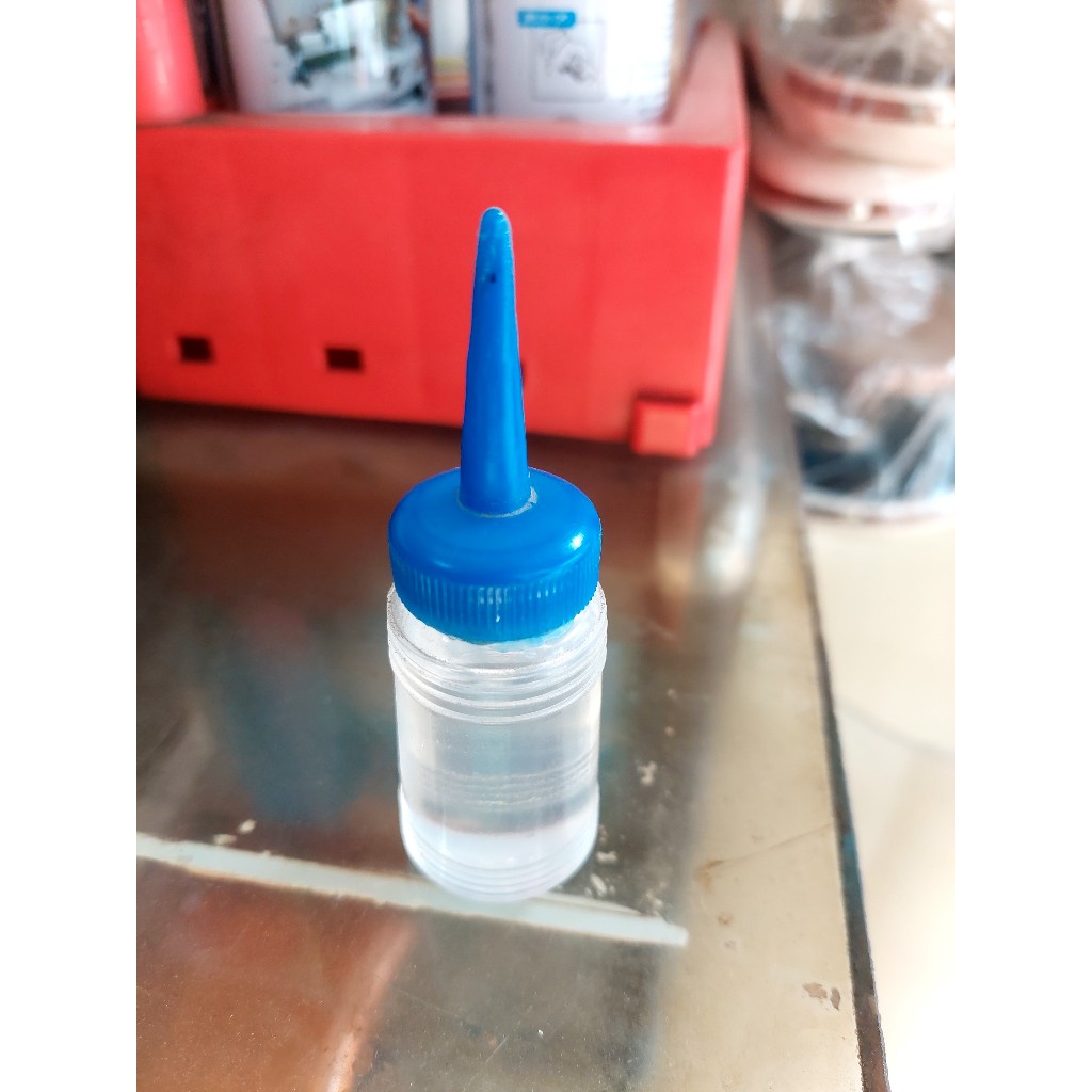 chai dầu bôi chơn máy chạy bộ