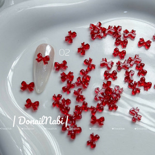 Set 50 charm đính móng  nơ nhựa đỏ