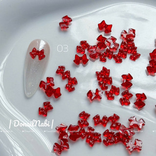 Set 50 charm đính móng  nơ nhựa đỏ