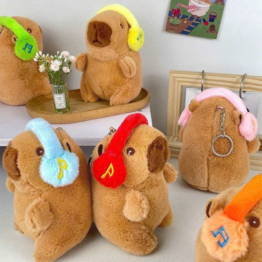 Móc khóa Capybara nhồi bông đeo tai nghe đáng yêu, móc khóa gấu bông mô phỏng Capybara