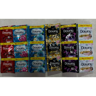 Nước xả vải Downy dây 10 gói  tặng 2 ( dây 12 gói ) .