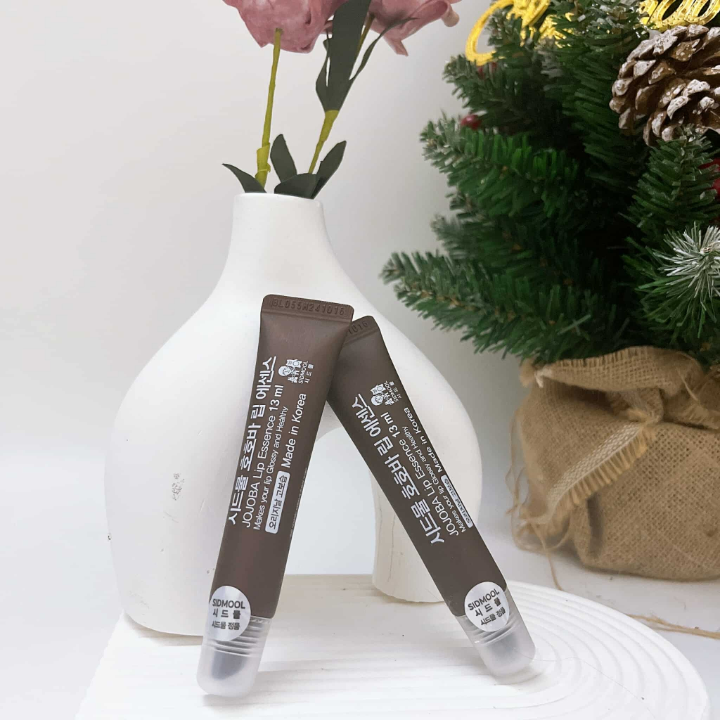 Son dưỡng Jojoba Sidmool Lip Essence 13ml duownxg môi jojoba