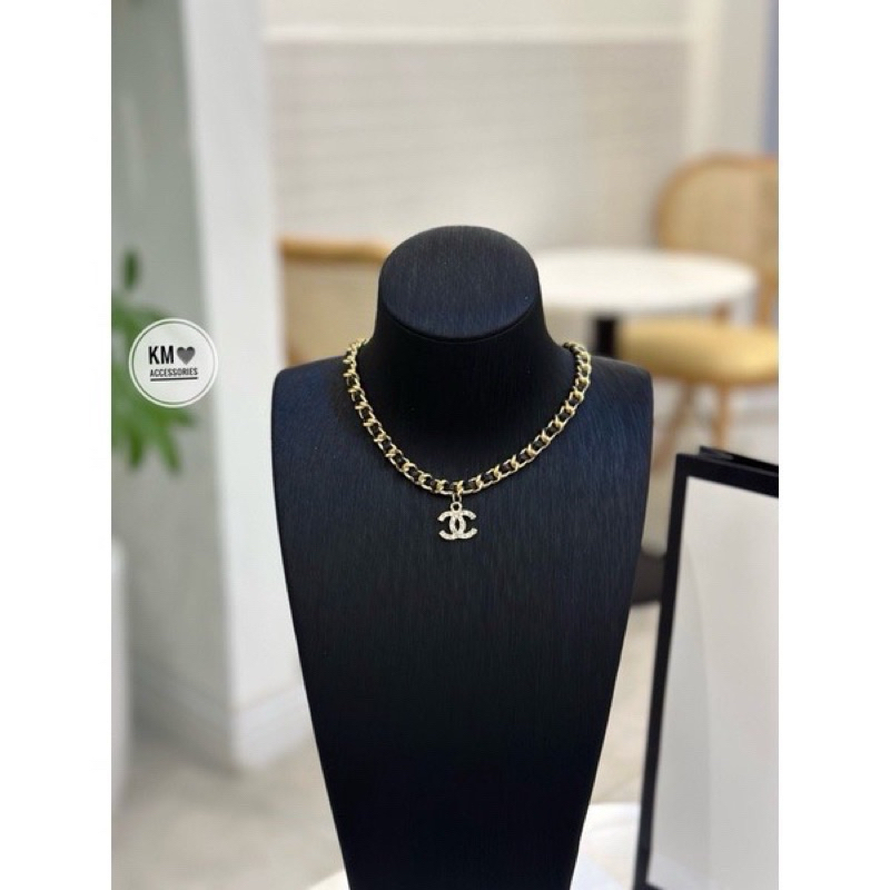 vòng cổ  xích vàng dây da chữ x đá