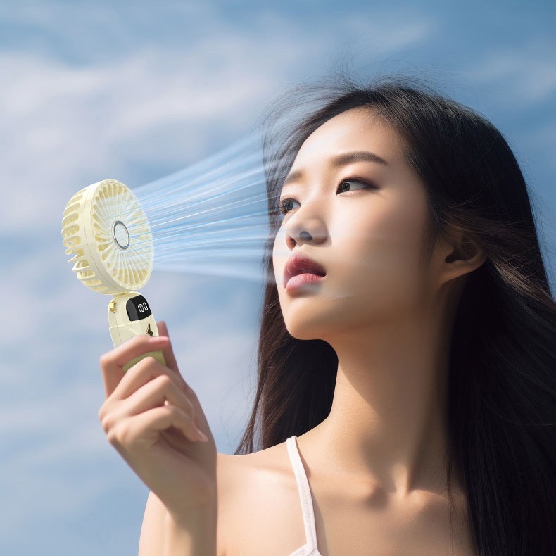 Quạt cầm tay mini gấp gọn có giá đỡ điện thoại tiện lợi HAKI DN285