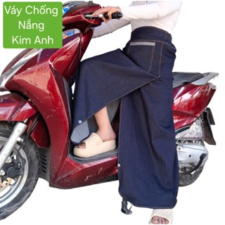 Váy Chống Nắng xẻ Եà  Jean , miếng dán kết hợp nút bấm - dưới chân váy có nút bấm .