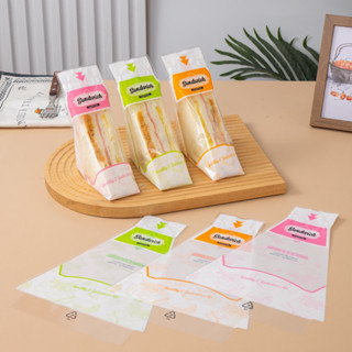 túi tam giác đựng bánh sandwich xấp 98-100 túi