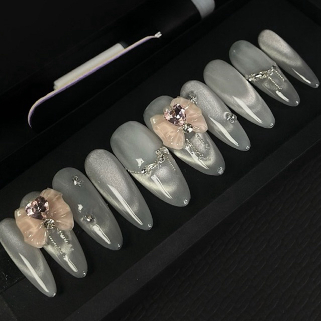 Nail box thạch mắt mèo đính charm nơ đá