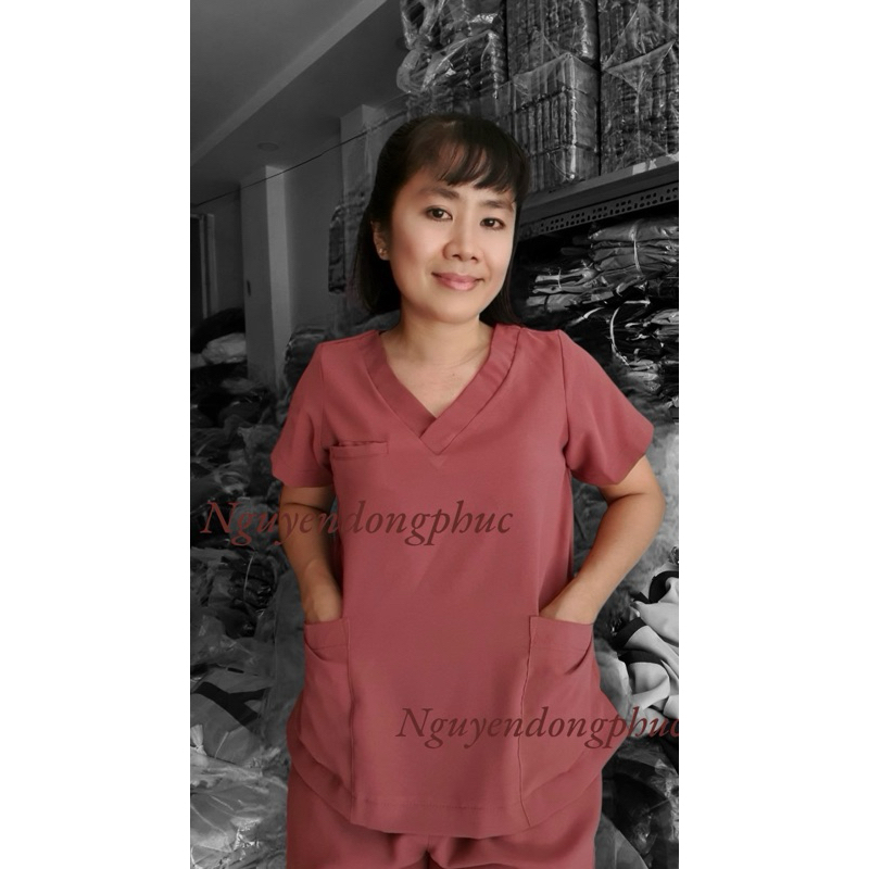Đồng phục spa màu cam đất